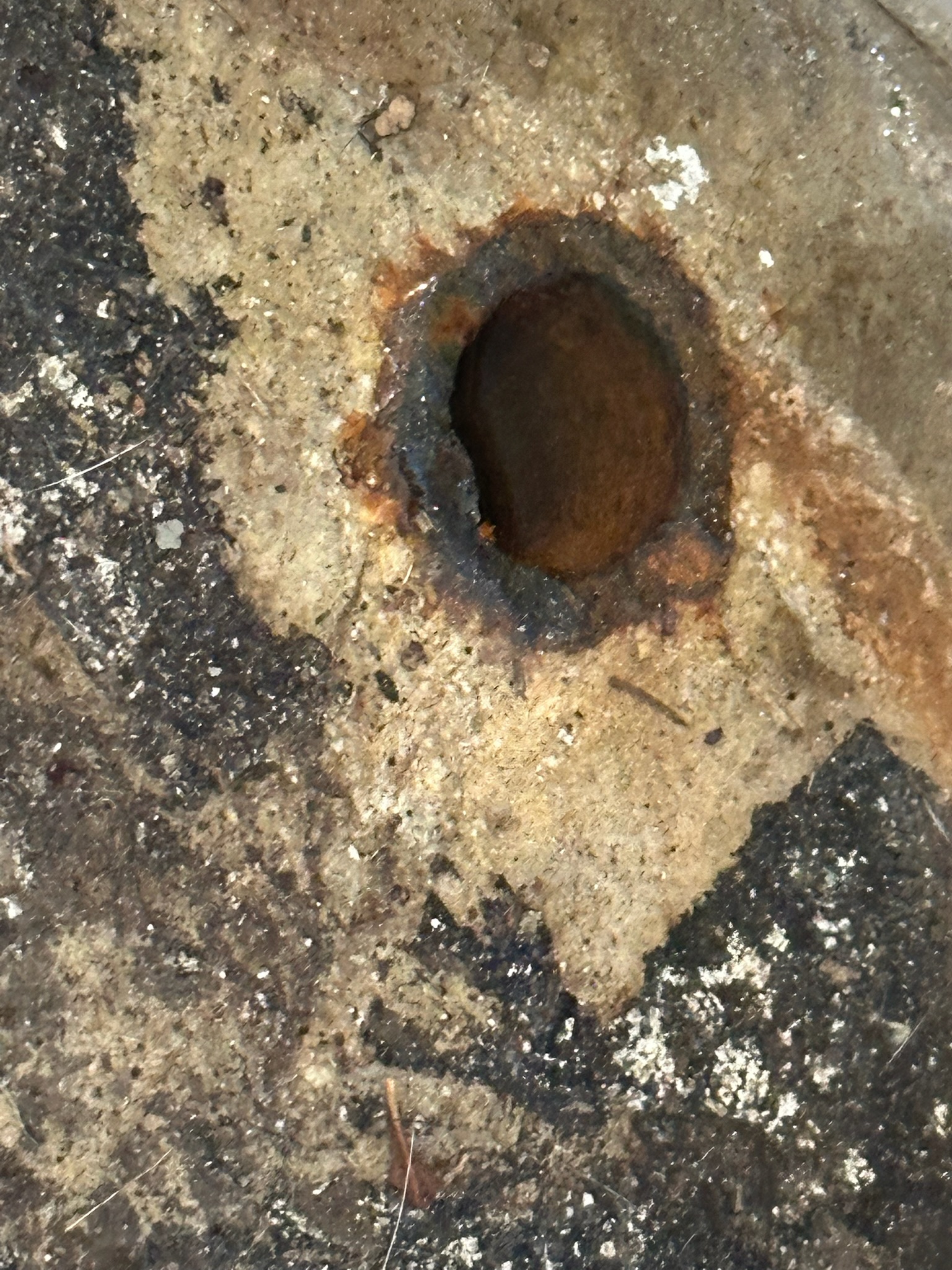 Hidden galvanized pipe under Clearwater home causing mystery leak.