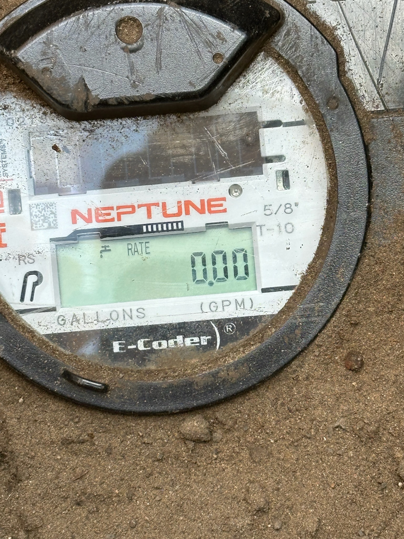 Clearwater water meter displaying 0.00 GPM during initial leak check.