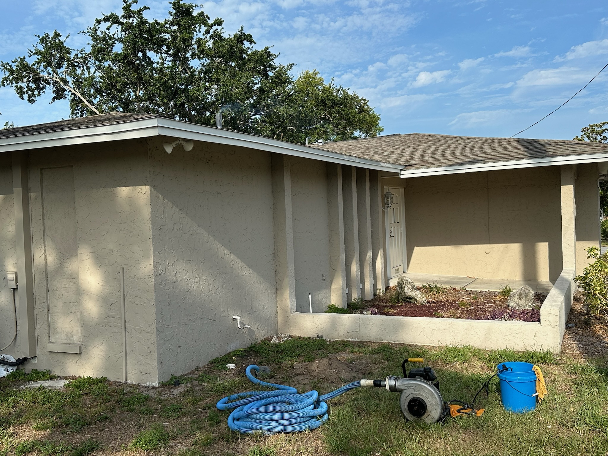Hurco smoke machine used for sewer odor detection outside a Palm Harbor office building in Pinellas County.