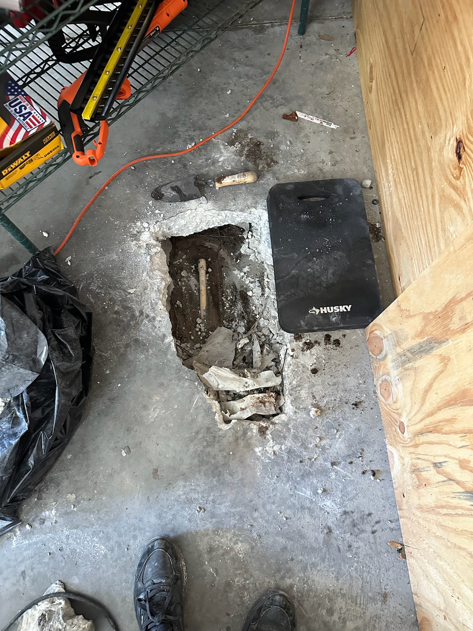 Exposed CPVC pipe beneath concrete slab in Tampa home leak detection