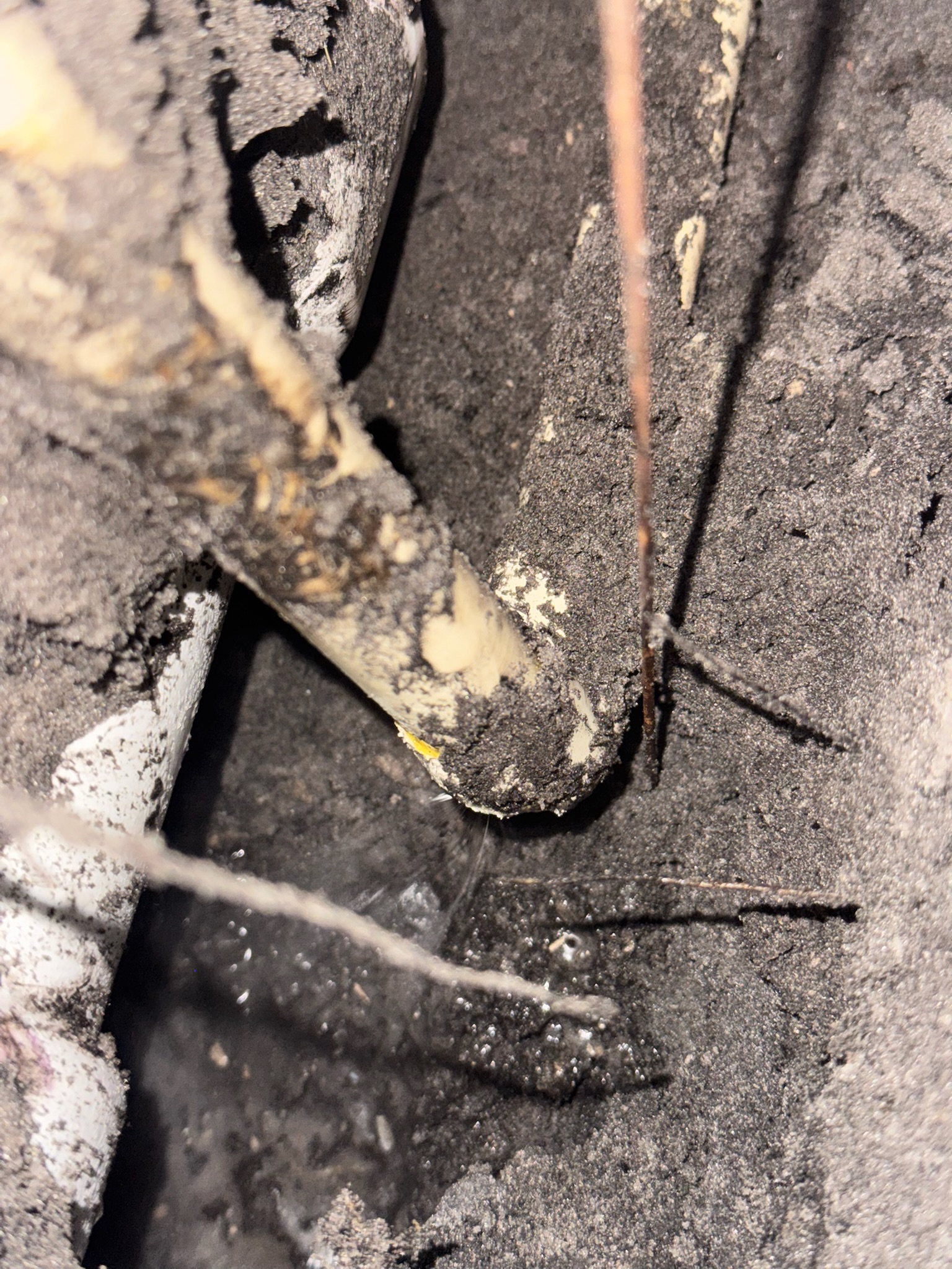 CPVC elbow leak showing fine mist of water after shut-off, brittle pipe damage