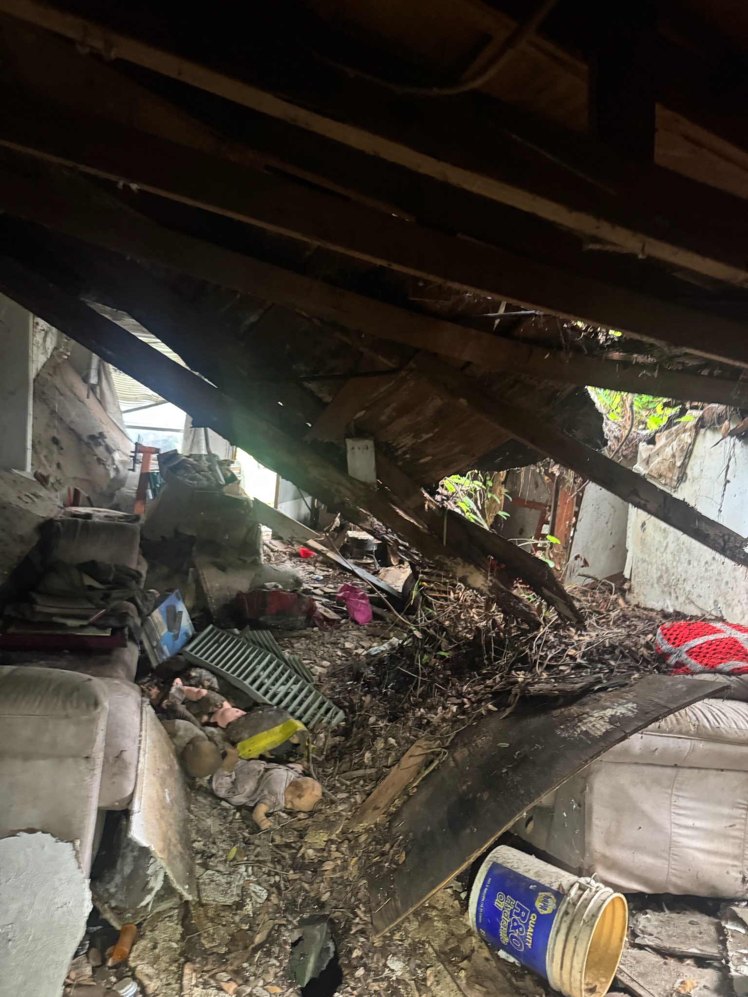 Hole in floor surrounded by baby dolls