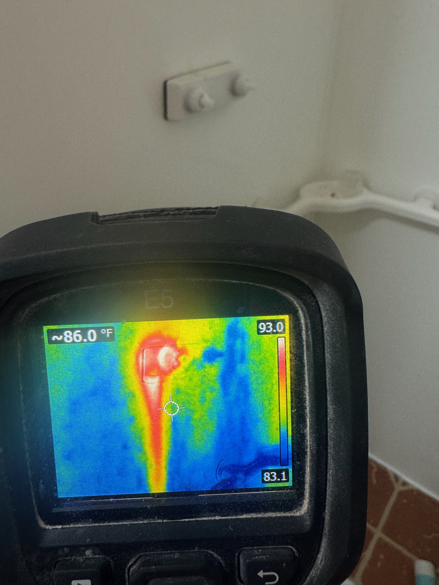 Infrared scan of shower valves Jeremy uses infrared camera to inspect shower valves in search of water leak in St. Petersburg bathroom