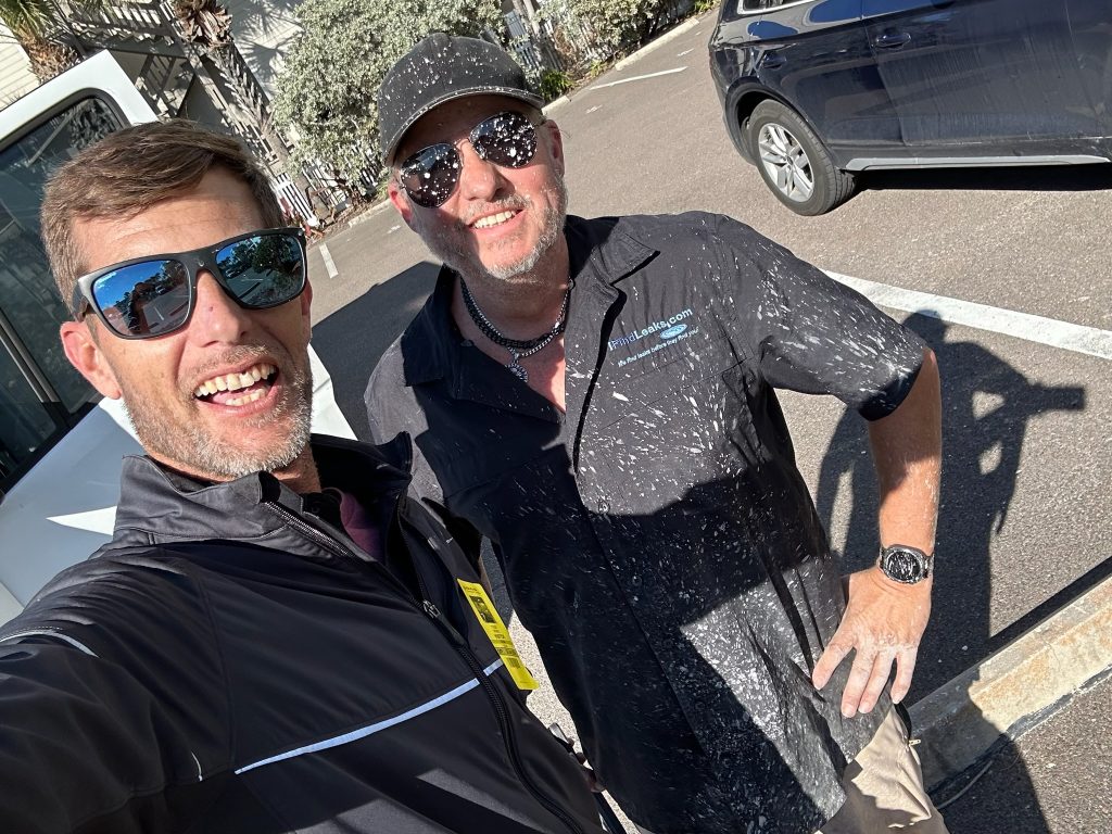 Tyler and Jeremy after jackhammering during Northeast St. Petersburg water leak detection job