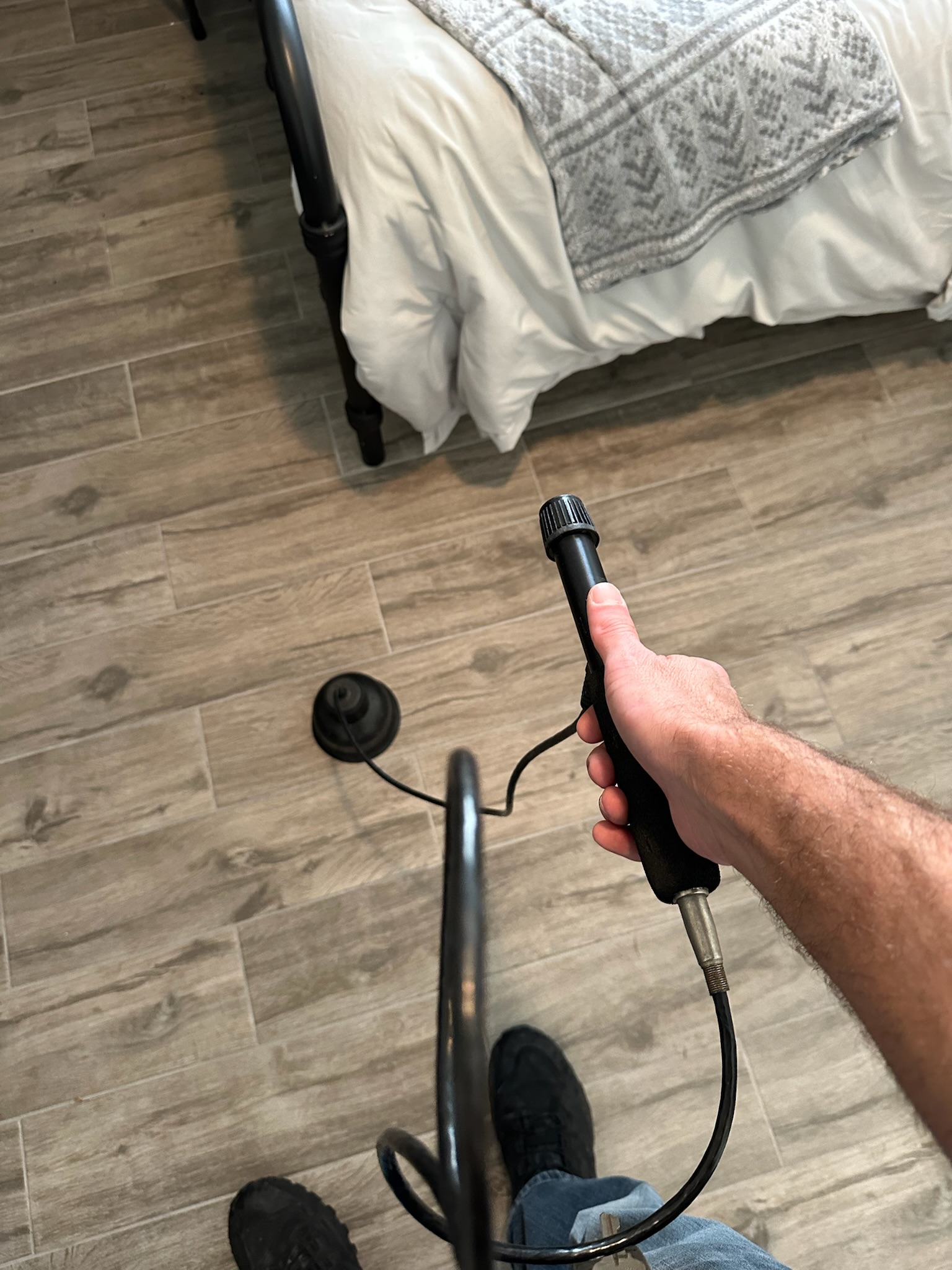 Fisher acoustic leak detection equipment used to refine slab leak location during high water bill investigation in St. Petersburg home