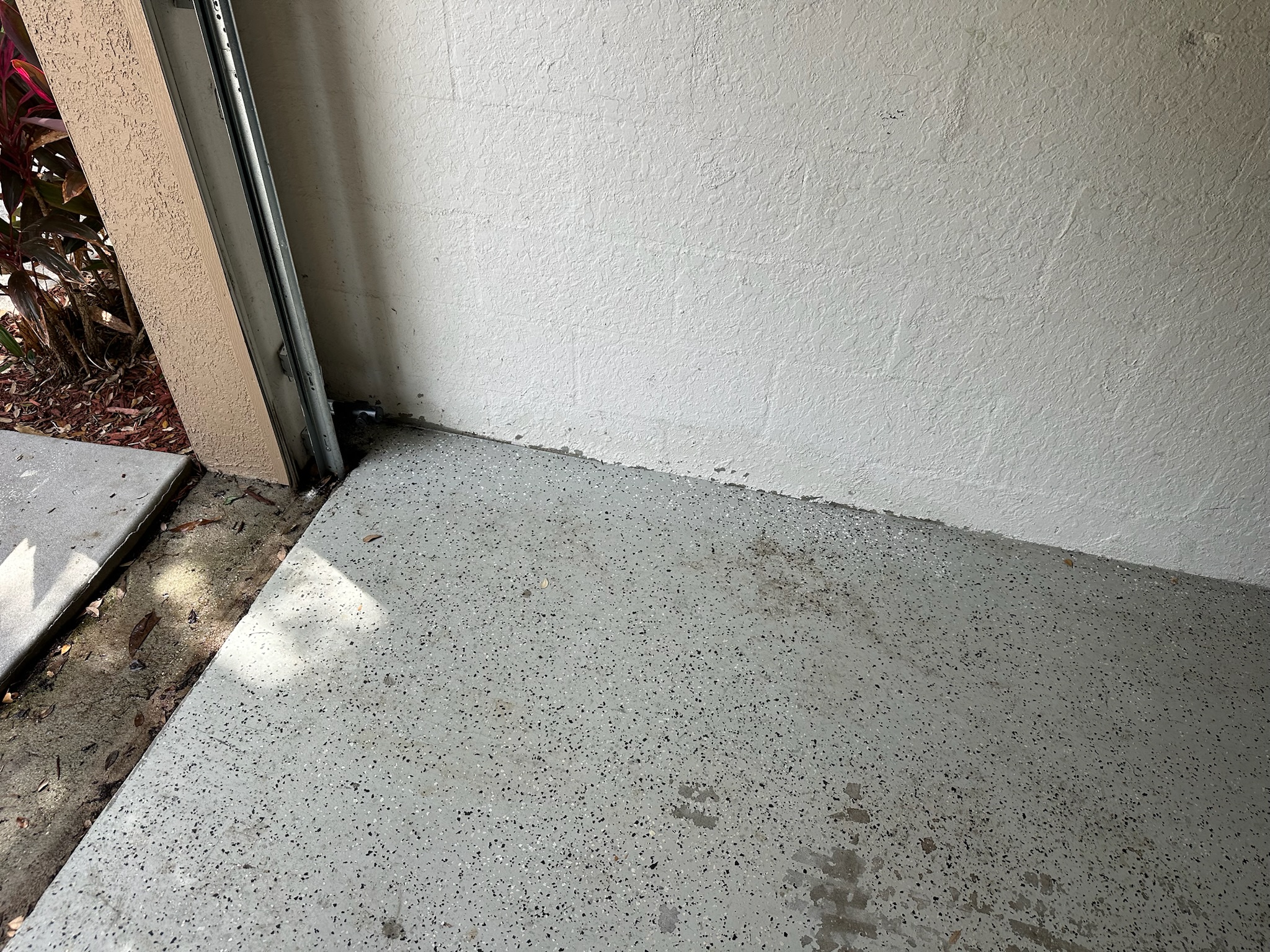 Water seeping through garage floor crack in Largo FL